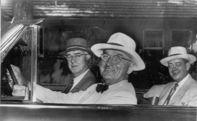 Harry Truman behind the wheel driving