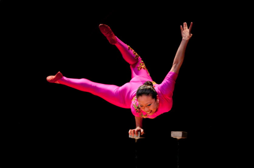 Chinese Acrobat Li Liu performs