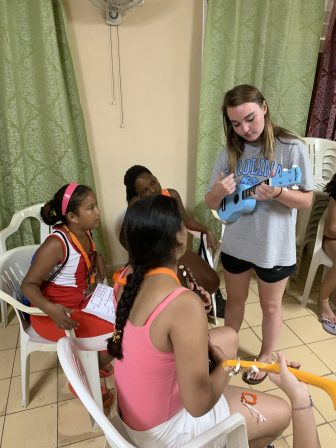 Saint Luke's Emma Hunter Cuba teaches ukelele