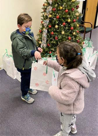 STAR Inc gifts to kids in Rubino Center