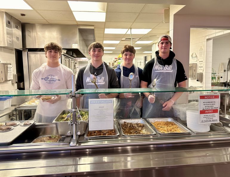 Football Team pies New Covenant House helpers